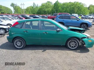 2002 Ford Focus ZX5 z VIN 3FAFP373X2R130965, wystawiony jako IAAI lot #42216638 z przebiegiem 59 236 mil mil oraz . Historia ofert i sprzedaży dostępna na DreamBid. Obrazek 13.