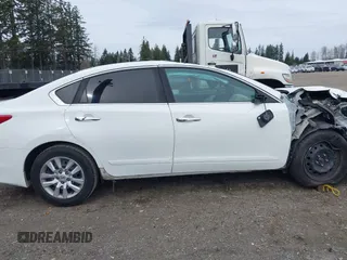 2016 Nissan Altima S z VIN 1N4AL3AP0GN385278, wystawiony jako IAAI lot #41771066 z przebiegiem 98 983 mil mil oraz . Historia ofert i sprzedaży dostępna na DreamBid. Obrazek 13.
