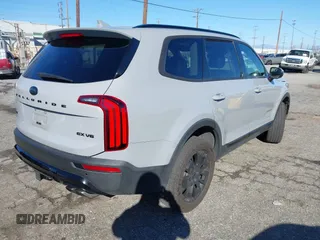 2021 Kia Telluride EX with VIN 5XYP3DHC5MG137169, listed as a IAAI auction lot 41635390 with 75,337 mi miles and . Bid and sale history available at DreamBid. Image 4.