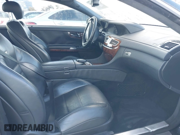 2009 Mercedes-Benz CL-Class V8 AMG with VIN WDDEJ77X89A020041, listed as a IAAI auction lot 41590508 with 127,040 mi miles. Bid and sale history available at carsss.com. Image 5.