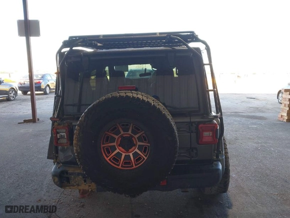 2018 Jeep Wrangler Unlimited Rubicon with VIN 1C4HJXFN1JW185914, listed as a IAAI auction lot 41360730 with 152,777 mi miles. Bid and sale history available at carsss.com. Image 16.