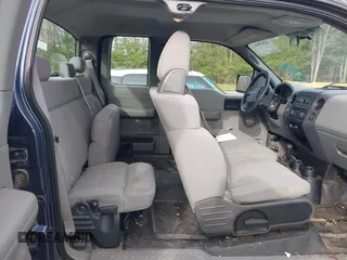 2005 Ford F-150 STX with VIN 1FTRX14W15FB47147, listed as a IAAI auction lot 42028662 with 174,354 mi miles. Bid and sale history available at carsss.com. Image 8.