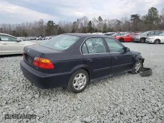 1999 Honda Civic EX with VIN 1HGEJ8641XL056616, listed as a Copart auction lot 45352295 with 162,291 mi miles and Salvage Title. Bid and sale history available at carsss.com. Image 3.
