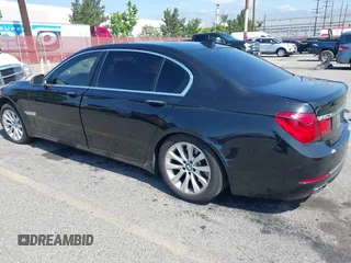 2015 BMW 7 Series 740Li with VIN WBAYE4C57FD138961, listed as a IAAI auction lot 42216122 with 224,740 mi miles and . Bid and sale history available at carsss.com. Image 3.