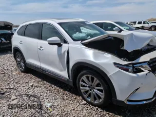 2023 Mazda CX-9 Signature with VIN JM3TCBEY7P0640089, listed as a Copart auction lot 61674085 with 55,387 mi miles and Salvage title. Bid and sale history available at DreamBid. Image 13.