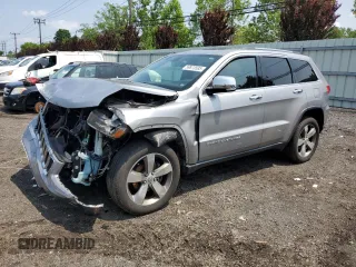 2014 Jeep Grand Cherokee Limited with VIN 1C4RJFBG9EC501136, listed as a Copart auction lot 59873595 with 203,819 mi miles and Salvage title. Bid and sale history available at DreamBid. Image 1.