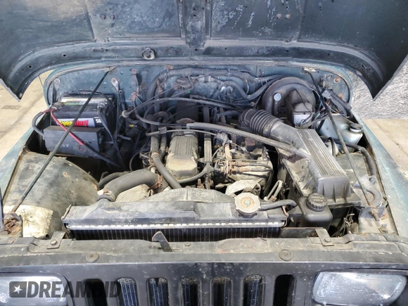 1994 Jeep Wrangler z VIN 1J4FY29S2RP471794, wystawiony jako Copart lot #47488005 z przebiegiem 165 900 mil mil oraz Nie do naprawy • Non repairable. Historia ofert i sprzedaży dostępna na DreamBid. Obrazek 12.