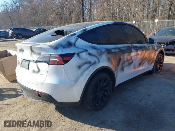 2022 Tesla Model Y Long Range with VIN 7SAYGDEE4NF532678, listed as a IAAI auction lot 41761130 with Not Provided miles and . Bid and sale history available at carsss.com. Image 4.