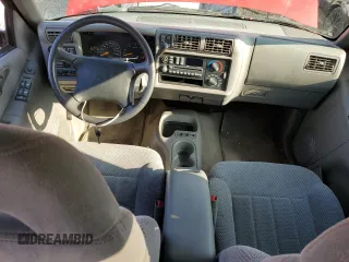 1995 Chevrolet Blazer z VIN 1GNDT13W4S2243226, wystawiony jako Copart lot #81429904 z przebiegiem 1 757 497 mil mil oraz Szkoda całkowita • Salvage title. Historia ofert i sprzedaży dostępna na DreamBid. Obrazek 8.