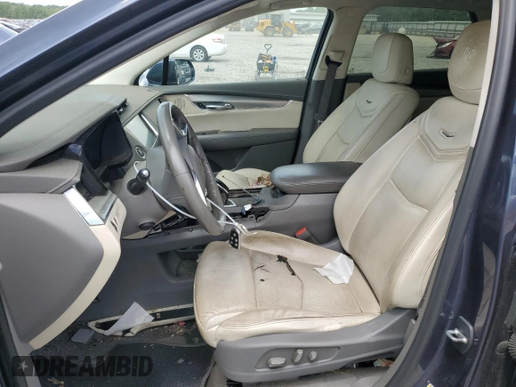 2019 Cadillac XT5 Luxury FWD with VIN 1GYKNCRSXKZ101832, listed as a Copart auction lot 54574825 with Not provided miles and Salvage title. Bid and sale history available at DreamBid. Image 7.