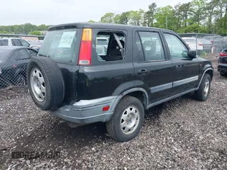 2000 Honda CR-V z VIN JHLRD1846YS009409, wystawiony jako IAAI lot #42253321 z przebiegiem 193 070 mil mil oraz . Historia ofert i sprzedaży dostępna na DreamBid. Obrazek 4.