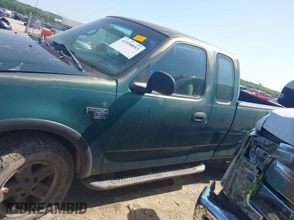 1999 Ford F-150 XL z VIN 2FTRX18L9XCA01139, wystawiony jako IAAI lot #42550053 z przebiegiem 263 950 mil mil oraz . Historia ofert i sprzedaży dostępna na DreamBid. Obrazek 14.
