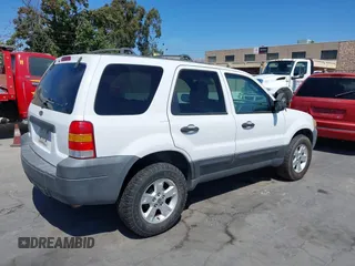 2005 Ford Escape XLT with VIN 1FMCU03195KA67225, listed as a IAAI auction lot 42614934 with 223,473 mi miles and . Bid and sale history available at DreamBid. Image 4.