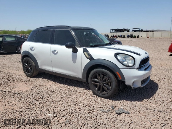 2016 MINI Countryman S with VIN WMWZC3C58GWT09694, listed as a Copart auction lot 57113235 with 126,082 mi miles and Salvage title. Bid and sale history available at DreamBid. Image 4.