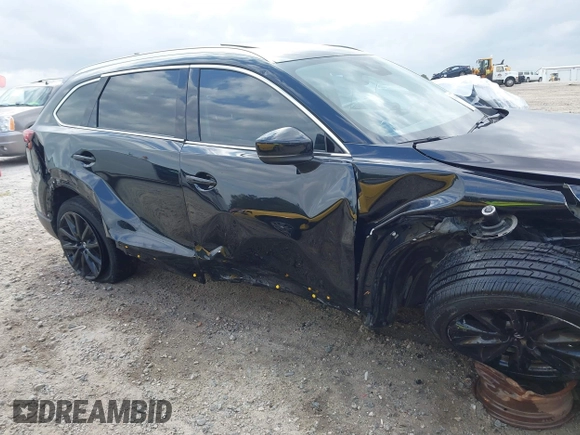 2022 Mazda CX-9 Touring Plus z VIN JM3TCBAYXN0613830, wystawiony jako IAAI lot #41942849 z przebiegiem 50 193 mil mil oraz . Historia ofert i sprzedaży dostępna na DreamBid. Obrazek 18.
