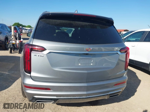 2025 Cadillac XT6 FWD Premium Luxury with VIN 1GYKPCRS3SZ118384, listed as a IAAI auction lot 41962391 with 6,946 mi miles. Bid and sale history available at carsss.com. Image 16.