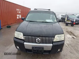 2007 Mercury Mariner Premier z VIN 4M2CU87167KJ19694, wystawiony jako IAAI lot #41496611 z przebiegiem 219 031 mil mil oraz . Historia ofert i sprzedaży dostępna na DreamBid. Obrazek 6.