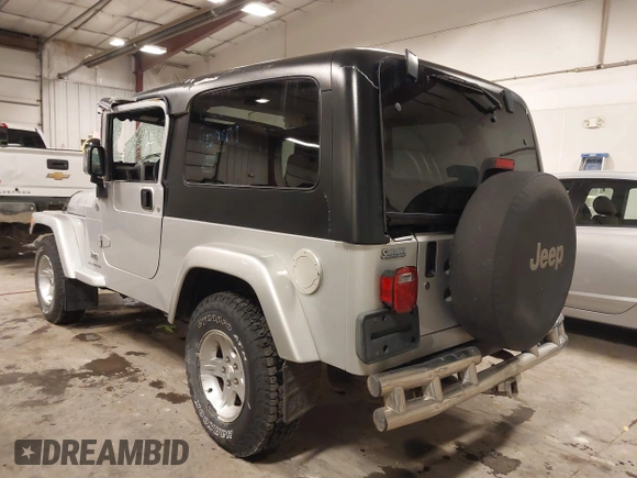 2005 Jeep Wrangler Unlimited with VIN 1J4FA44S05P359173, listed as a IAAI auction lot 41275179 with 75,035 mi miles. Bid and sale history available at carsss.com. Image 3.