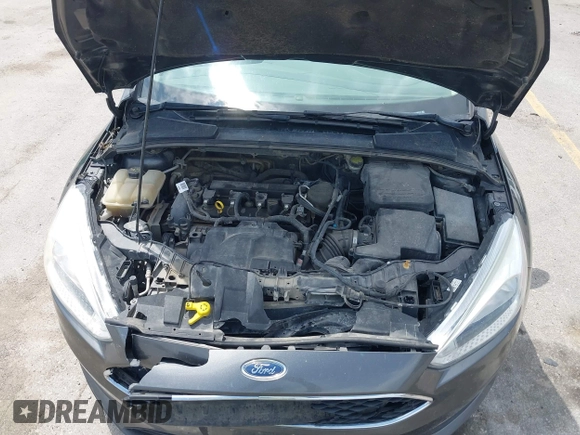 2016 Ford Focus SE z VIN 1FADP3F2XGL298174, wystawiony jako IAAI lot #42468032 z przebiegiem 236 803 mil mil oraz . Historia ofert i sprzedaży dostępna na DreamBid. Obrazek 10.