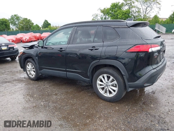2022 Toyota Corolla Cross LE with VIN 7MUCAABG8NV004527, listed as a IAAI auction lot 42259519 with 15,211 mi miles and . Bid and sale history available at DreamBid. Image 3.