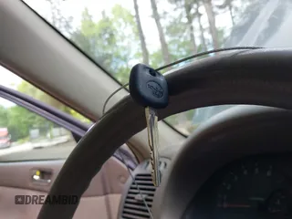 2002 Toyota Camry LE z VIN 4T1BE32K12U619689, wystawiony jako IAAI lot #42222078 z przebiegiem 216 591 mil mil oraz . Historia ofert i sprzedaży dostępna na DreamBid. Obrazek 11.