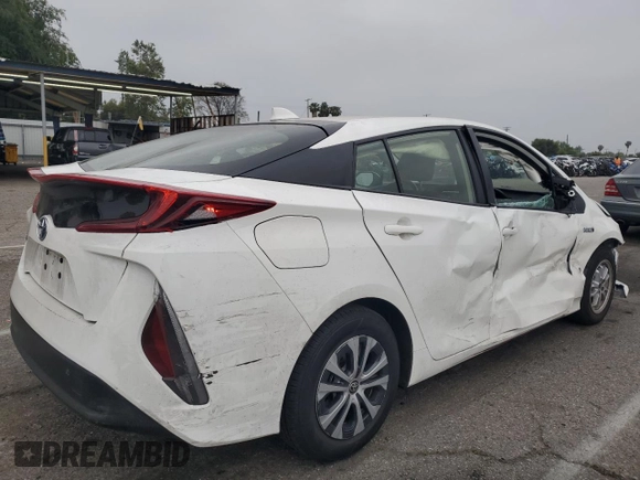 2021 Toyota Prius LE z VIN JTDKAMFP9M3196770, wystawiony jako Copart lot #54309555 z przebiegiem 21 948 mil mil oraz Szkoda całkowita • Salvage title. Historia ofert i sprzedaży dostępna na DreamBid. Obrazek 3.