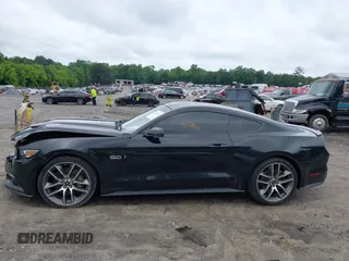 2015 Ford Mustang GT with VIN 1FA6P8CF2F5423037, listed as a IAAI auction lot 42370882 with 149,794 mi miles and . Bid and sale history available at DreamBid. Image 14.