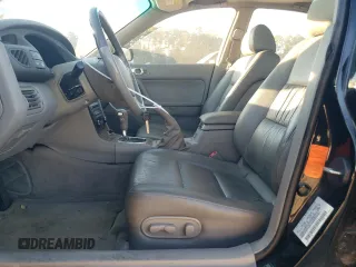 2002 Mazda Millenia z VIN JM1TA221021729625, wystawiony jako Copart lot #87304234 z przebiegiem 88 376 mil mil oraz Szkody całkowita. Historia ofert i sprzedaży dostępna na DreamBid. Obrazek 7.