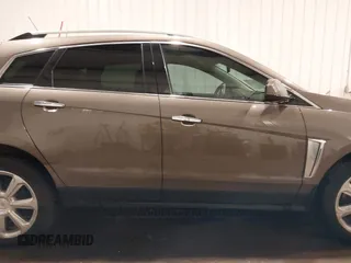 2014 Cadillac SRX Performance Collection z VIN 3GYFNFE38ES578066, wystawiony jako IAAI lot #42153023 z przebiegiem 134 009 mil mil oraz . Historia ofert i sprzedaży dostępna na DreamBid. Obrazek 14.