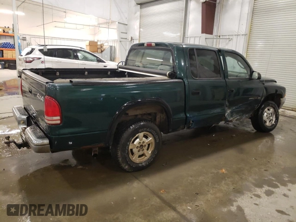 2002 Dodge Dakota SLT with VIN 1B7HG48N42S725145, listed as a Copart auction lot 82690584 with 159,161 mi miles and Salvage Title. Bid and sale history available at carsss.com. Image 3.