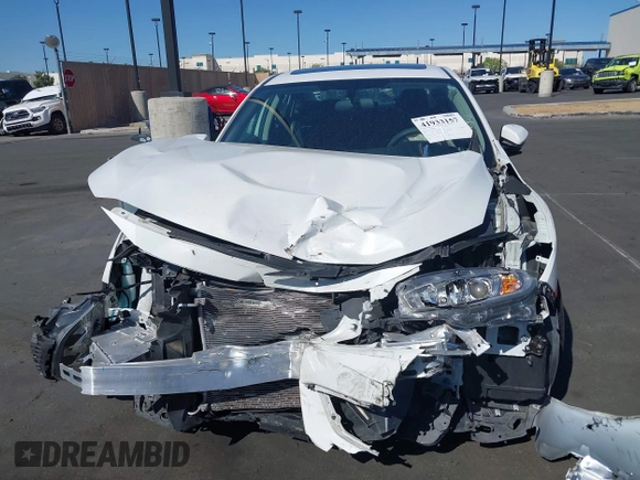 2018 Honda Civic EX with VIN 2HGFC2F71JH502564, listed as a IAAI auction lot 41933157 with 56,696 mi miles and . Bid and sale history available at DreamBid. Image 12.