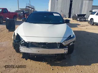 2020 Nissan Maxima SR with VIN 1N4AA6EVXLC365710, listed as a IAAI auction lot 40969464 with 74,320 mi miles and . Bid and sale history available at DreamBid. Image 12.
