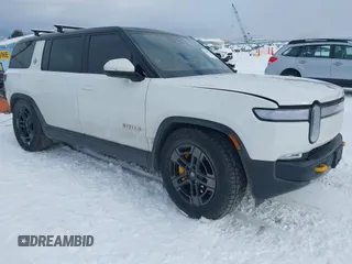 2023 Rivian R1S Adventure z VIN 7PDSGABA9PN015327, wystawiony jako IAAI lot #41484133 z przebiegiem Nie podano mil oraz . Historia ofert i sprzedaży dostępna na DreamBid. Obrazek 1.