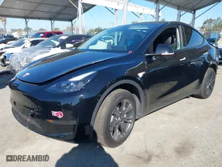 2024 Tesla Model Y with VIN 7SAYGDED1RF212991, listed as a IAAI auction lot 41644411 with NaN miles. Bid and sale history available at carsss.com. Image 18.
