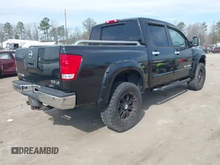 2007 Nissan Titan LE with VIN 1N6BA07B47N238148, listed as a IAAI auction lot 41683144 with 149,655 mi miles. Bid and sale history available at carsss.com. Image 4.