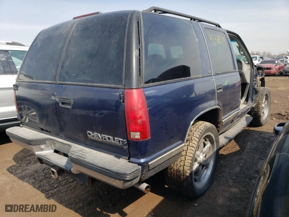 1999 Chevrolet Tahoe Z71 with VIN 1GNEK13R2XJ523810, listed as a Copart auction lot 64247874 with 151,373 mi miles and Salvage Title. Bid and sale history available at carsss.com. Image 3.