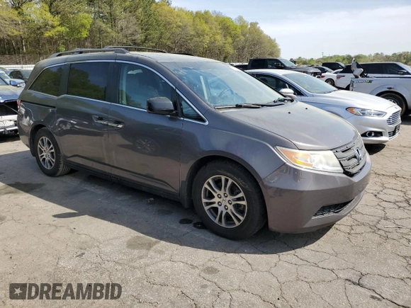2011 Honda Odyssey EX-L with VIN 5FNRL5H63BB067278, listed as a Copart auction lot 51147855 with 240,414 mi miles and Salvage Title. Bid and sale history available at DreamBid. Image 4.