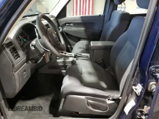 2012 Jeep Liberty Sport with VIN 1C4PJMAK1CW129000, listed as a Copart auction lot 49472635 with 77,124 mi miles and Salvage Title. Bid and sale history available at DreamBid. Image 7.