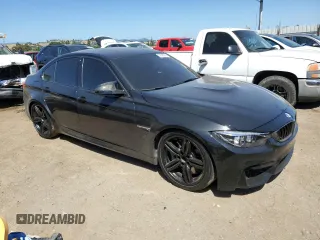 2018 BMW M3 with VIN WBS8M9C50J5K98422, listed as a Copart auction lot 57500235 with 62,915 mi miles and Salvage title. Bid and sale history available at DreamBid. Image 4.