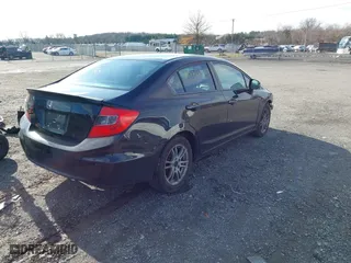 2012 Honda Civic Sdn LX with VIN 19XFB2F56CE104670, listed as a IAAI auction lot 41137265 with 247,887 mi miles. Bid and sale history available at carsss.com. Image 4.