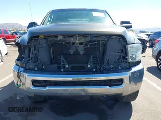 2012 Ram 2500 ST z VIN 3C6TD5CT6CG290580, wystawiony jako IAAI lot #41755239 z przebiegiem 207 282 mil mil oraz . Historia ofert i sprzedaży dostępna na DreamBid. Obrazek 12.
