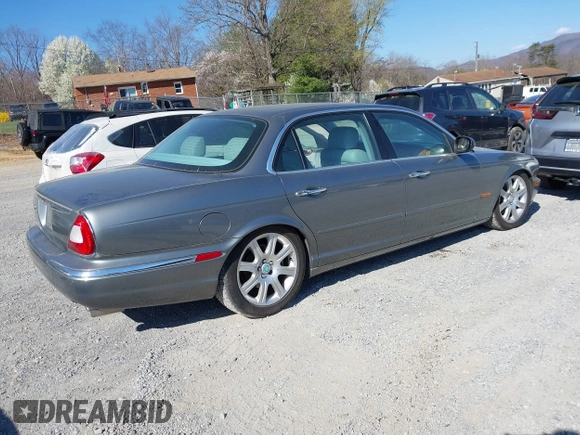 2005 Jaguar XJ with VIN SAJWA79C85SG48974, listed as a IAAI auction lot 41844684 with 154,145 mi miles. Bid and sale history available at carsss.com. Image 4.