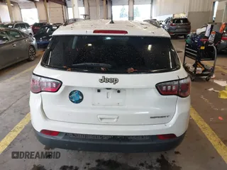 2018 Jeep Compass Sport with VIN 3C4NJCAB6JT124198, listed as a IAAI auction lot 41192196 with 104,557 mi miles. Bid and sale history available at carsss.com. Image 16.