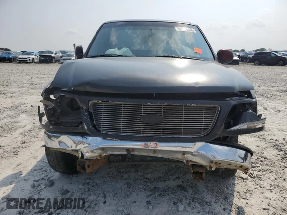2002 Ford F-150 XL z VIN 1FTRF17252NB52123, wystawiony jako Copart lot #58778435 z przebiegiem Nie podano mil oraz Szkoda całkowita • Salvage title. Historia ofert i sprzedaży dostępna na DreamBid. Obrazek 5.