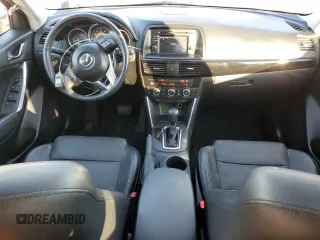 2014 Mazda CX-5 Grand Touring with VIN JM3KE2DY8E0412025, listed as a Copart auction lot 42863655 with 72,416 mi miles and Salvage Title. Bid and sale history available at carsss.com. Image 8.