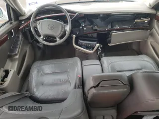 2002 Cadillac DeVille z VIN 1G6KD54Y42U247207, wystawiony jako Copart lot #77691724 z przebiegiem 71 514 mil mil oraz Szkody całkowita. Historia ofert i sprzedaży dostępna na DreamBid. Obrazek 8.