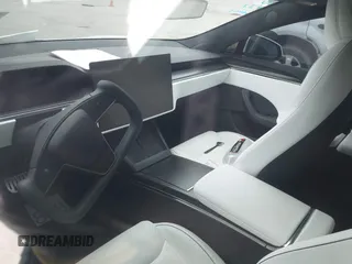 2021 Tesla Model S Plaid z VIN 5YJSA1E64MF452744, wystawiony jako IAAI lot #41375136 z przebiegiem Nie podano mil oraz . Historia ofert i sprzedaży dostępna na DreamBid. Obrazek 16.
