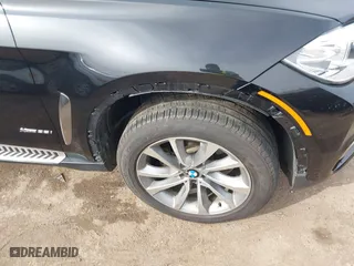 2015 BMW X6 xDrive35i with VIN 5UXKU2C56F0F95429, listed as a IAAI auction lot 41754635 with 79,503 mi miles. Bid and sale history available at carsss.com. Image 6.