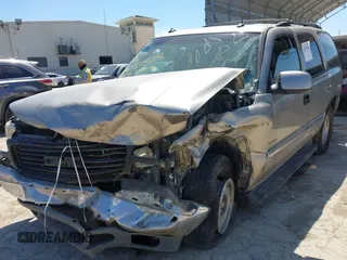 2003 GMC Yukon SLT z VIN 1GKEC13T73R169865, wystawiony jako IAAI lot #42238716 z przebiegiem Nie podano mil oraz . Historia ofert i sprzedaży dostępna na DreamBid. Obrazek 6.