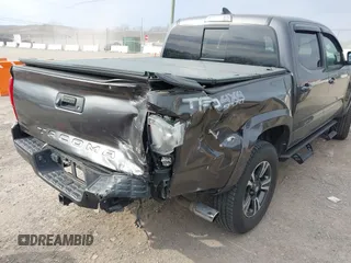 2018 Toyota Tacoma SR with VIN 3TMCZ5AN0JM150540, listed as a IAAI auction lot 41683174 with 78,553 mi miles and . Bid and sale history available at DreamBid. Image 6.